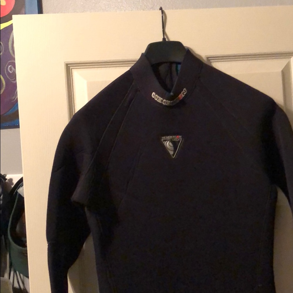 Full body wetsuit. 7.5 mm used